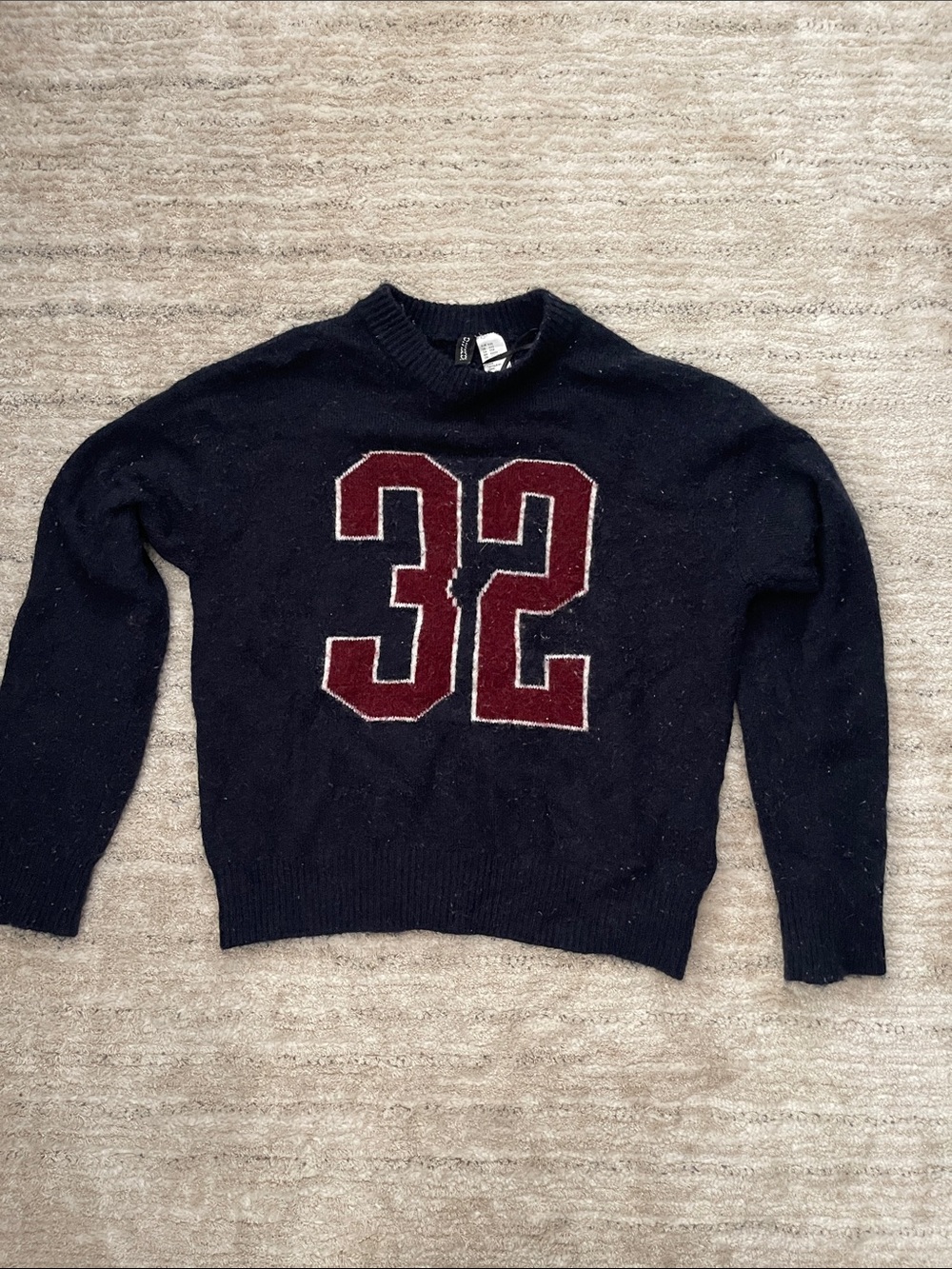Divided Black Sweater with Burgundy '32' Applique